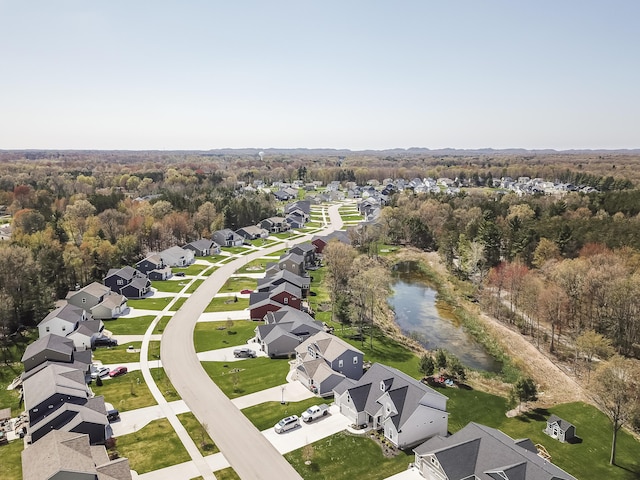 aerial view with a forest view and a residential view