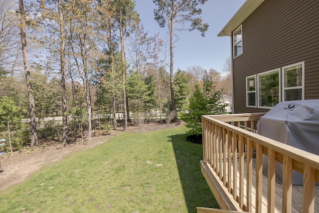 view of yard featuring a wooden deck