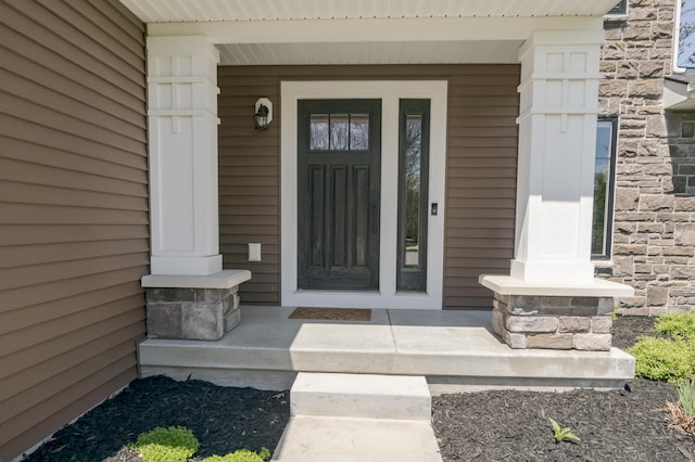 entrance to property with a porch