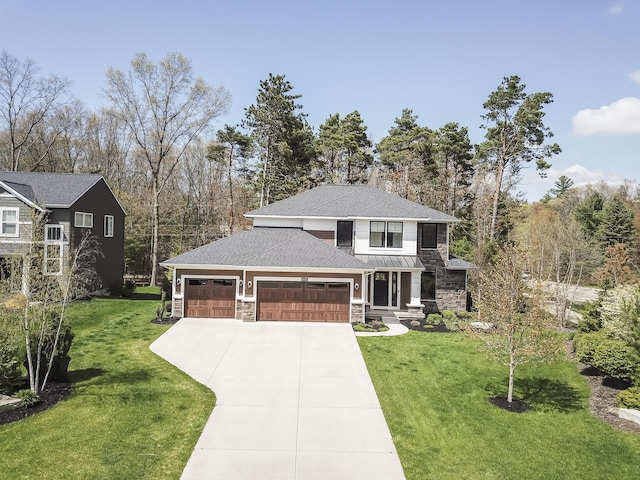 view of front facade featuring a front yard, a garage, stone siding, and driveway