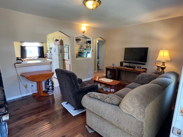 1452 E Madge Ave, Hazel Park, MI 48030 - living area featuring dark wood-style floors and baseboards