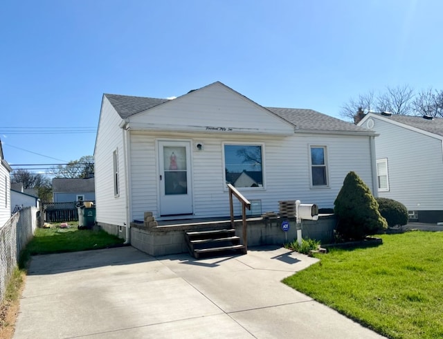 1452 E Madge Ave, Hazel Park, MI 48030 - view of front of home with a shingled roof