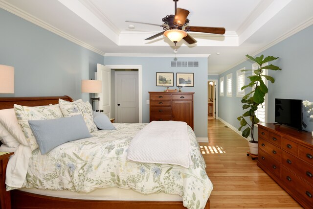 1256 Lenhill Ct, Bloomfield Hills, MI 48304 - bedroom featuring light wood-style flooring, a raised ceiling, crown molding, baseboards, and ceiling fan