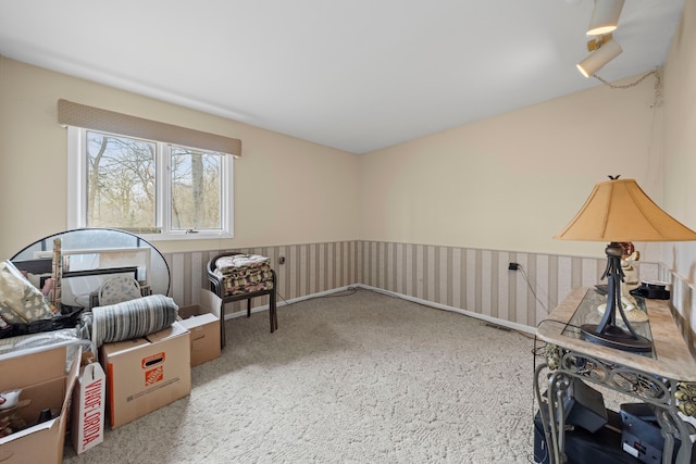 sitting room with carpet floors and visible vents