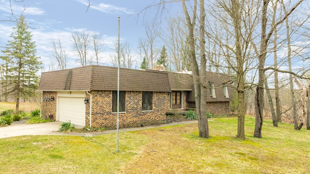 view of front of house with brick siding, driveway, a front lawn, a shingled roof, and mansard roof