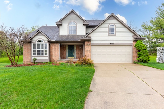 traditional-style house featuring brick siding, concrete driveway, roof with shingles, a front yard, and a garage