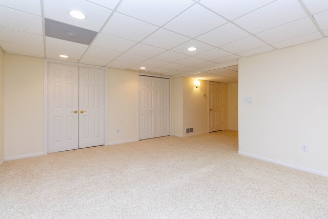carpeted empty room featuring recessed lighting and baseboards