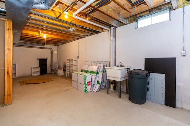 basement featuring a sink