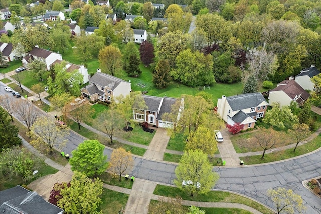 aerial view of property's location with nearby suburban area