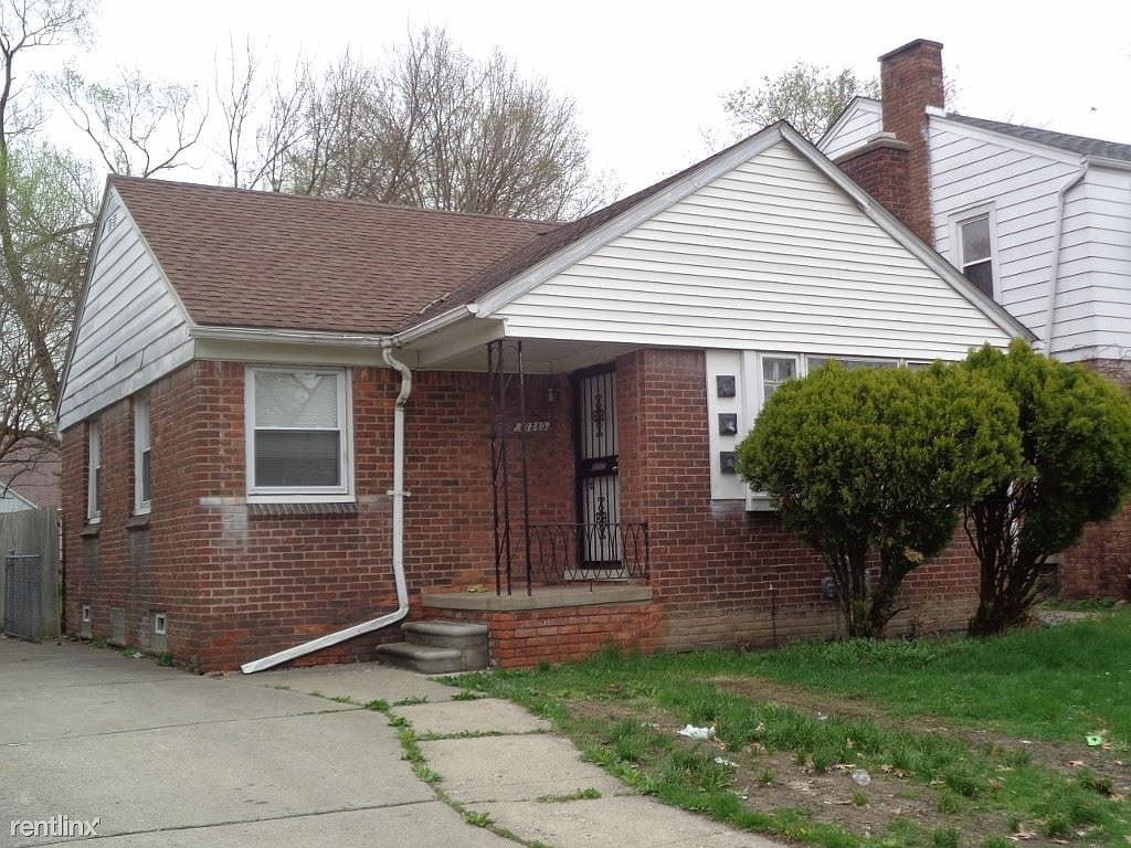 16580 Ward St, Detroit, MI 48235 - view of front facade featuring roof with shingles and brick siding