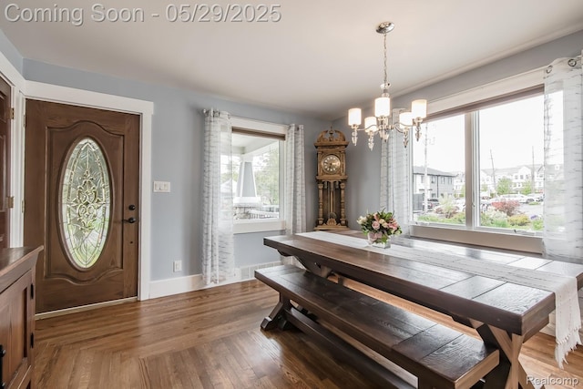 61 Cutting Dr, Troy, MI 48085 - dining room featuring a chandelier and baseboards