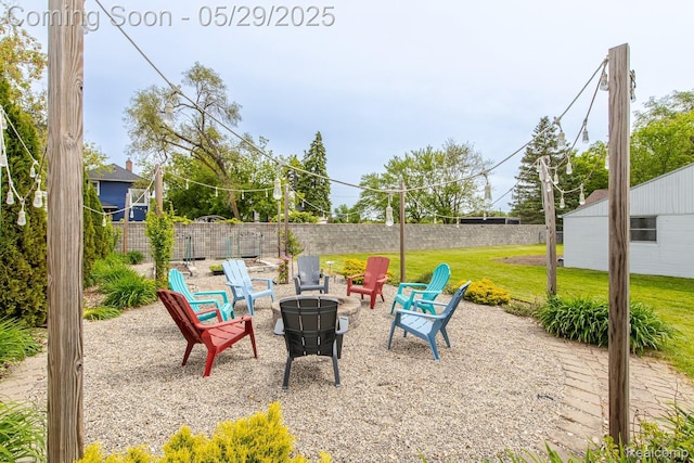 61 Cutting Dr, Troy, MI 48085 - view of patio featuring an outdoor fire pit
