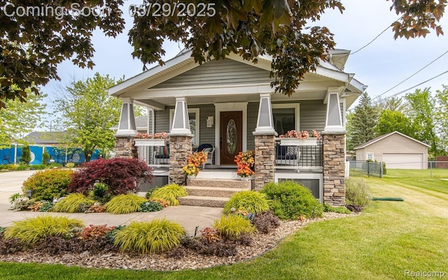 61 Cutting Dr, Troy, MI 48085 - craftsman house with stone siding, covered porch, and a garage