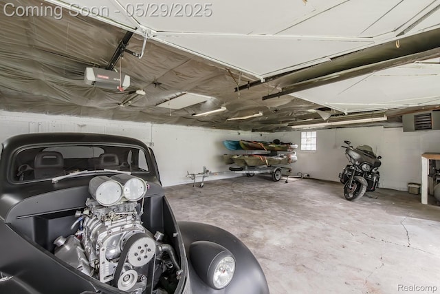 61 Cutting Dr, Troy, MI 48085 - garage featuring a garage door opener
