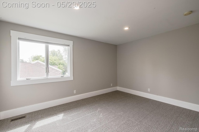 61 Cutting Dr, Troy, MI 48085 - spare room featuring dark carpet, baseboards, recessed lighting, and a smoke detector