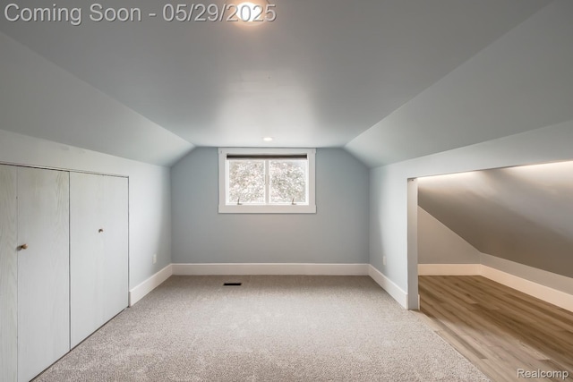 61 Cutting Dr, Troy, MI 48085 - bonus room with vaulted ceiling, baseboards, and carpet flooring