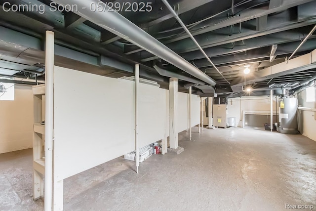 61 Cutting Dr, Troy, MI 48085 - unfinished below grade area featuring gas water heater and heating unit