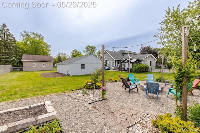61 Cutting Dr, Troy, MI 48085 - view of patio / terrace with an outdoor fire pit