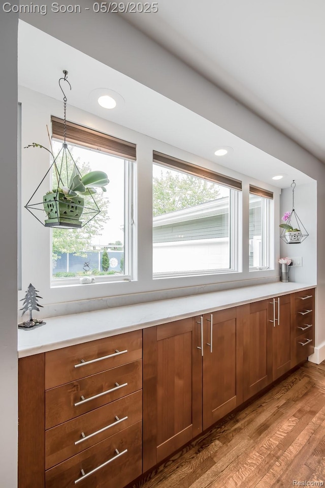 61 Cutting Dr, Troy, MI 48085 - kitchen featuring healthy amount of natural light, brown cabinets, light countertops, and recessed lighting