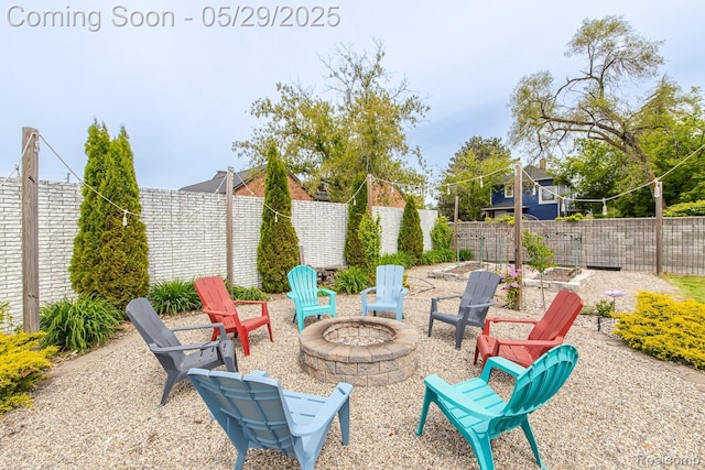 61 Cutting Dr, Troy, MI 48085 - fenced backyard featuring a fire pit