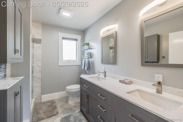 61 Cutting Dr, Troy, MI 48085 - full bath featuring double vanity, a shower, toilet, and baseboards