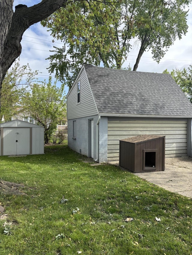 7543 Ford Ave, Warren, MI 48091 - garage featuring a storage shed