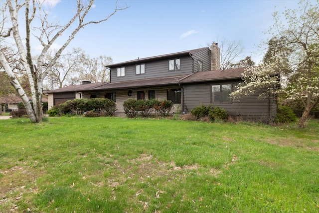view of front of home featuring a chimney and a front lawn