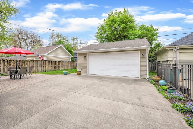 detached garage with fence