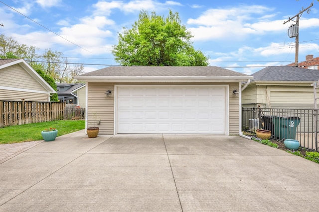 detached garage with fence