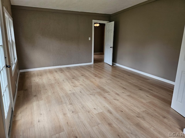 4084 Seneca St, Weston, MI 49289 - spare room with baseboards and light wood finished floors