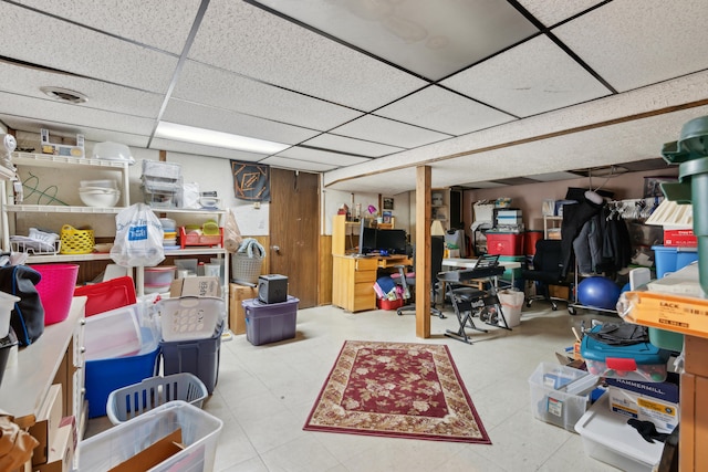 finished basement with a drop ceiling