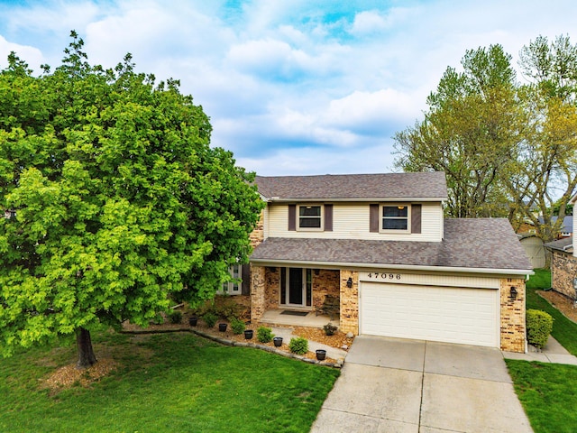 traditional-style home featuring brick siding, driveway, a front yard, and roof with shingles