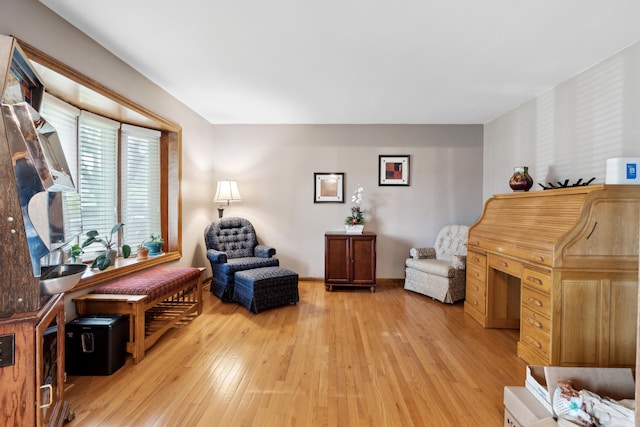 sitting room featuring light wood-style floors