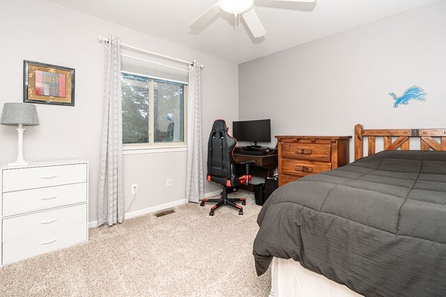 bedroom featuring carpet floors, baseboards, and ceiling fan