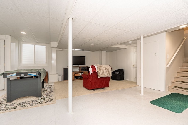playroom with recessed lighting, a paneled ceiling, and tile patterned floors