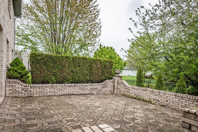 gate with a patio and fence