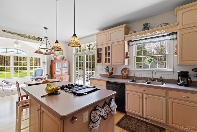 5225 Bent Oak Hwy, Adrian, MI 49221 - kitchen featuring light brown cabinets, a center island, dishwasher, a sink, and stovetop with downdraft
