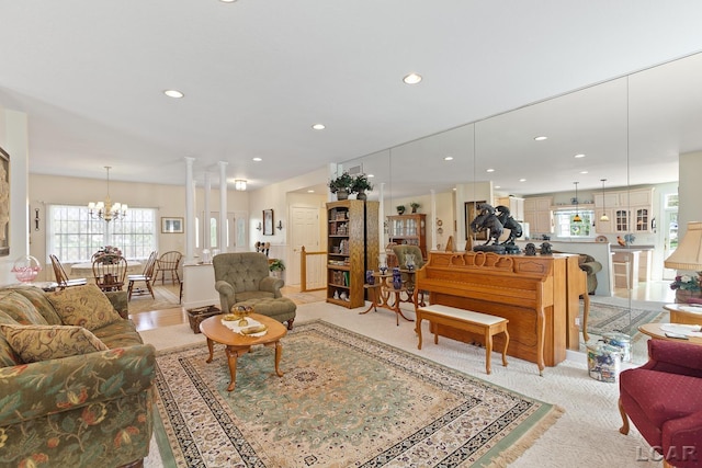 5225 Bent Oak Hwy, Adrian, MI 49221 - living area featuring an inviting chandelier, light carpet, and recessed lighting