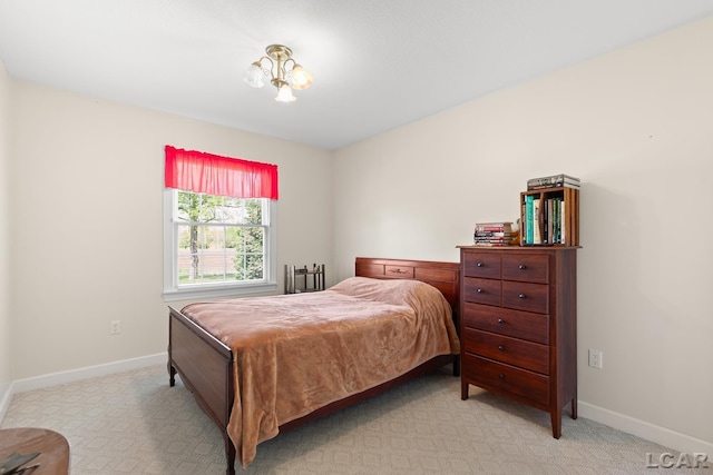 5225 Bent Oak Hwy, Adrian, MI 49221 - bedroom with baseboards and light colored carpet