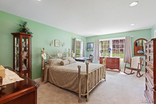 5225 Bent Oak Hwy, Adrian, MI 49221 - bedroom with light colored carpet, baseboards, and recessed lighting