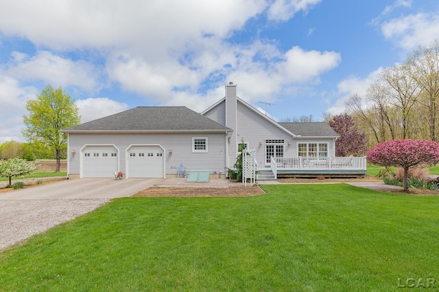 5225 Bent Oak Hwy, Adrian, MI 49221 - exterior space featuring an attached garage, a chimney, a wooden deck, concrete driveway, and a front lawn