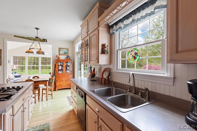 5225 Bent Oak Hwy, Adrian, MI 49221 - kitchen featuring a sink, stovetop with downdraft, decorative light fixtures, dishwasher, and light wood-style flooring