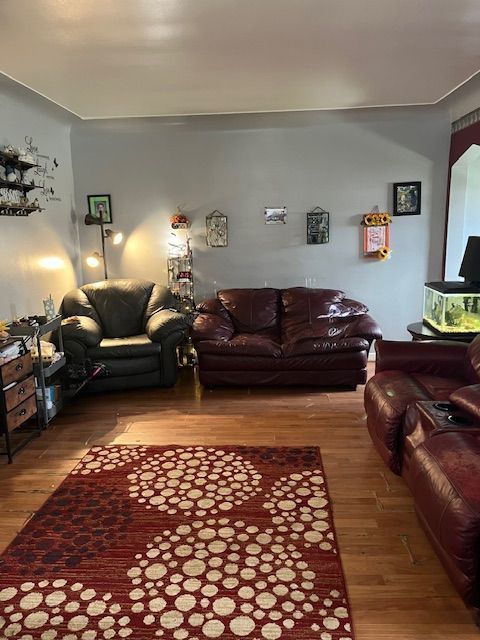 living area with wood finished floors