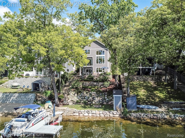 841 Hurley Dr, Howell, MI 48843 - dock featuring stairs