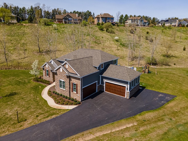 bird's eye view with a residential view