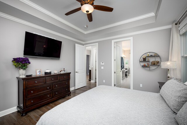 bedroom featuring ceiling fan, ornamental molding, baseboards, and dark wood-type flooring