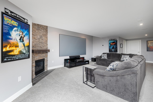 living room with a fireplace, carpet floors, baseboards, and recessed lighting
