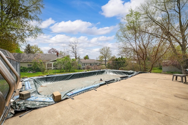 view of swimming pool with fence, a patio, and a fenced in pool