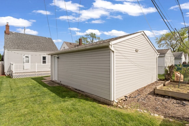 5125 Curtis St, Dearborn, MI 48126 - garage with a vegetable garden