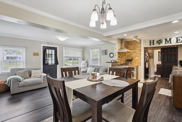 dining area featuring dark wood-style flooring, recessed lighting, a chandelier, and crown molding